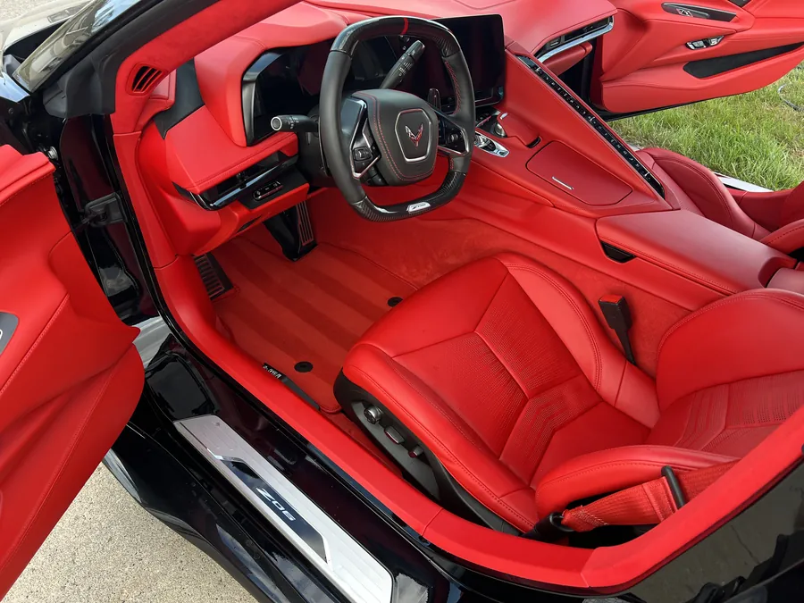 Freshly detailed red leather interior of a Corvette Z06